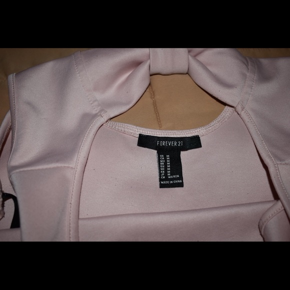 Forever 21 pink peplum bow top, Size M. - Picture 3 of 3